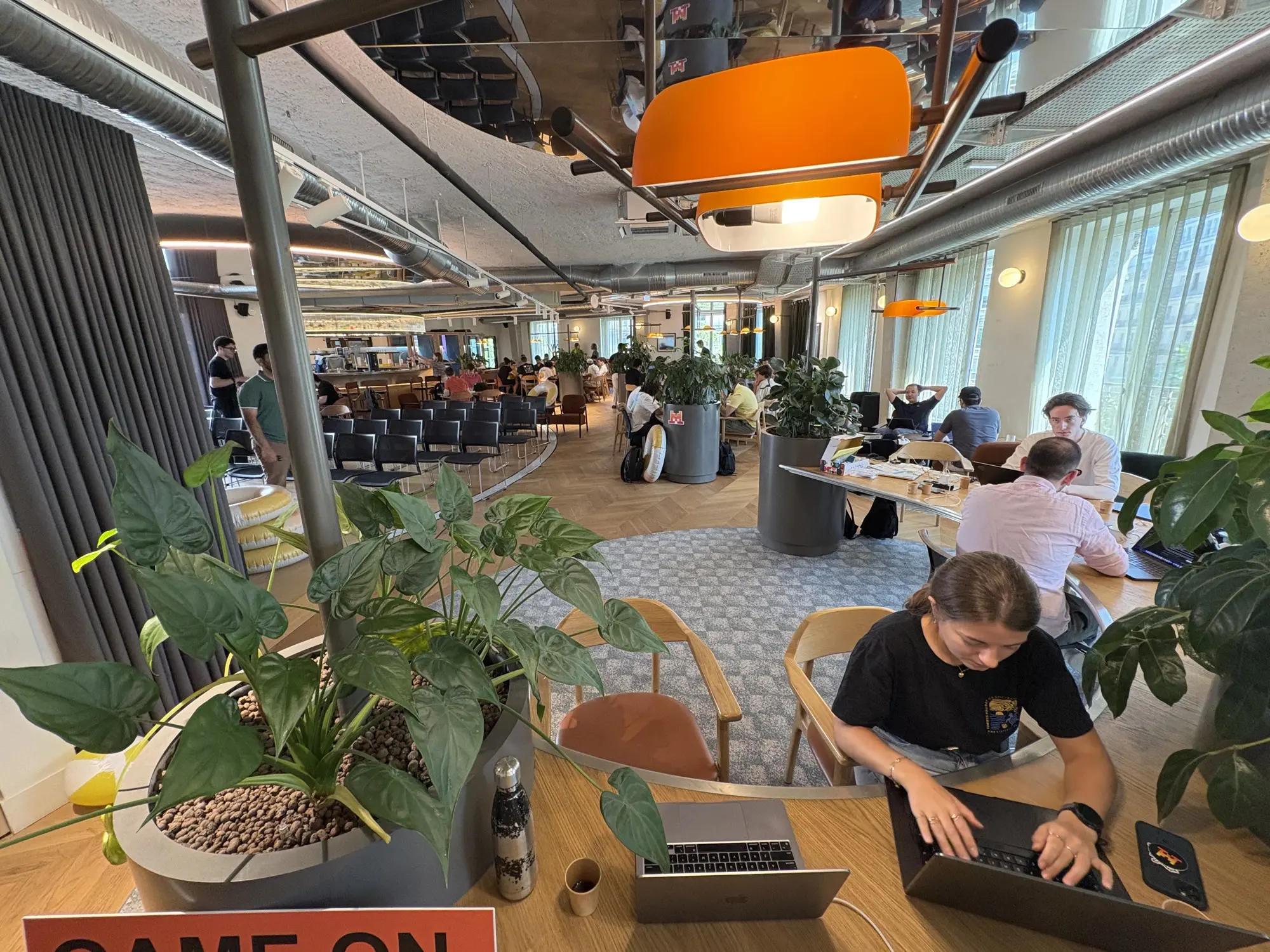 The main room of the Mistral Vibe Hackathon