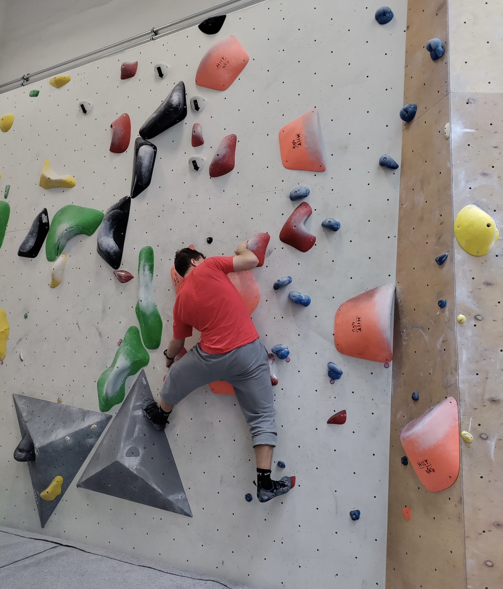 Konstantin trying bouldering for the first time.